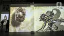 Pengunjung melihat karya proyeksi video mapping di pameran imersif Affandi: Alam, Ruang, Manusia di Galeri Nasional Indonesia, Jakarta, Rabu (28/10/2020). Pameran berlangsung hingga 25 November 2020. (Liputan6.com/Johan Tallo)