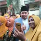 Gus Muhammad Fawait saat melakukan serap aspirasi bersama ibu-ibu kelompok pengajian dari Srikandi Laskar Sholawat Nusantara. (Foto: Istimewa).
