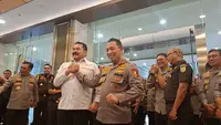 Jaksa Agung ST Burhanuddin dan Kapolri Listyo Sigit salam komando. (Rifqy Alief Abiyya)