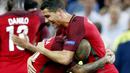 Cristiano Ronaldo dan Ricardo Quaresma merayakan kemenangan Portugal atas Polandia pada perempat final Piala Eropa 2016 di Stade Velodrome, Marseille, Jumat (30/6/2016) dini hari WIB. (EPA/Guillaume Horcajuelo)