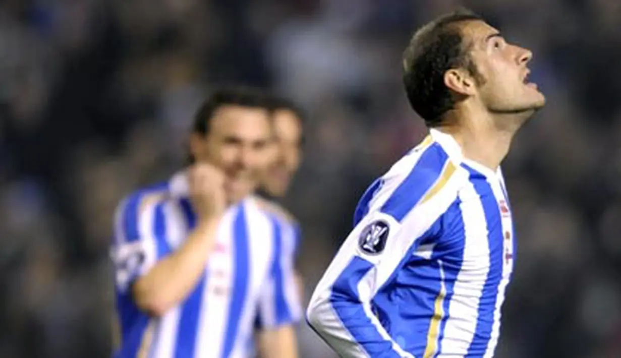Deportivo La Coruna's Alberto Lopo celebrates after scoring against Feyenoord during their UEFA Cup group H match at Riazor Stadium in Coruna, on November 27, 2008. AFP PHOTO/MIGUEL RIOPA