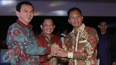 Ki-ka: Gubernur DKI Jakarta, Basuki Tjahaja Purnama,  Mantan Kalpoda Metro Jaya, Irjen Pol Tito Karnavian dan Kalpoda Metro Jaya, Irjen Pol Moechgiyarto saat acara Pisah Sambut Kapolda Metro Jaya, Jakarta, Senin (21/3). (Liputan6.com/Herman Zakharia)