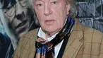 Penampilan Gambon sebagai kepala sekolah Hogwarts ini langsung memikat hati penggemar franchise Harry Potter. (JASON KEMPIN / GETTY IMAGES NORTH AMERICA / GETTY IMAGES VIA AFP)