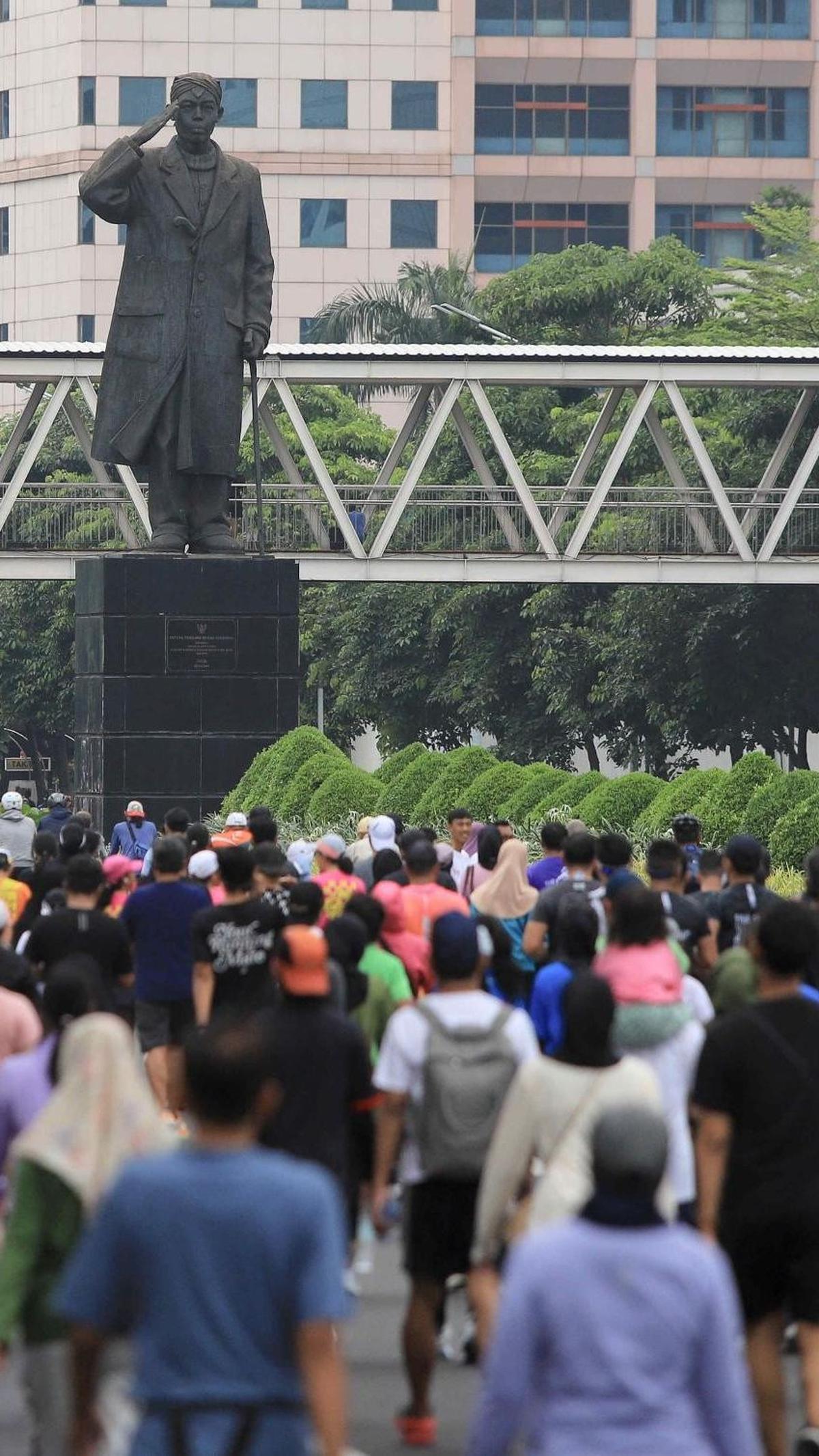 Sejak subuh mereka sudah mulai memadati jalan protokol Jakarta dari Jenderal Sudirman hingga MH Thamrin. Foto: Liputan6.com / Herman Zakharia