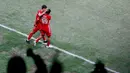 <p>Pemain Persija Jakarta, Taufik Hidayat (kanan) melakukan selebrasi bersama Rezaldi Hehanusa usai mencetak gol ke gawang Chonburi FC saat laga persahabatan antara Persija Jakarta menghadapi Chonburi FC dalam rangka Grand Launching Jakarta International Stadium (JIS), Minggu (24/7/2022). (Bola.com/M Iqbal Ichsan)</p>