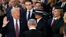 Donald Trump resmi menjabat sebagai Presiden ke-47 Amerika Serikat usai membacakan sumpah jabatan pada Senin (20/1/2025) waktu setempat di Rotunda Gedung Kongres AS, Washington D.C. (Julia Demaree Nikhinson/AFP)