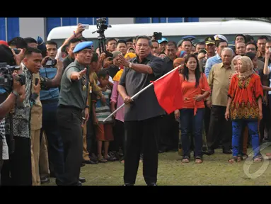 Sby dengan senang hati mau menjadi juri lomba lari pesta rakyat, Bogor, Selasa (18/8/2014) (Liputan6.com/Johan Tallo)