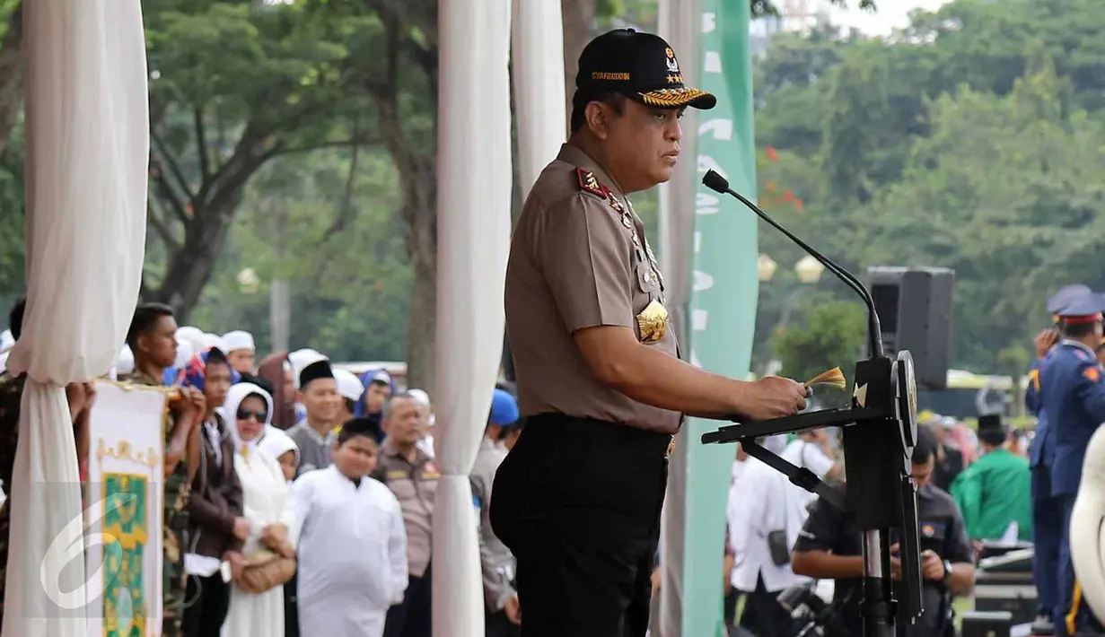 Wakapolri Komjen Pol Syafruddin. (Liputan6.com/Fery Pradan sambutan di hadapan santri dalam Upacara Hari Santri Nasional di silang Monas, Jakarta, Sabtu (22/10). Hari Santri Nasional ditetapkan pemerintah melalui Keppres nomolo)