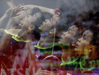 Tunggal putra Indonesia, Anthony Sinisuka Ginting, saat melawan wakil Denmark, Anders Antonsen, pada laga final Daihatsu Indonesia Masters 2020 di Istora, Jakarta, Minggu (19/1). Anthony Ginting menang 17-21, 21-15, dan 21-9. (Bola.com/M Iqbal Ichsan)