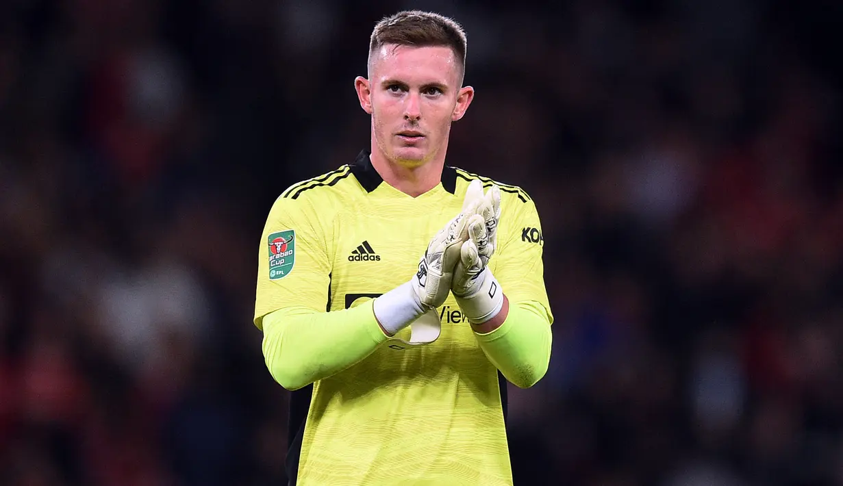 Dean Henderson masih kalah bersaing dengan David De Gea di bawah mistar gawang Manchester United. Meskipun begitu, ia dianggap salah satu kiper terbaik di Liga Inggris dengan menorehkan presentase penyelamatan sebesar 76%, lebih baik dari De Gea. (AFP/Oli Scarff)