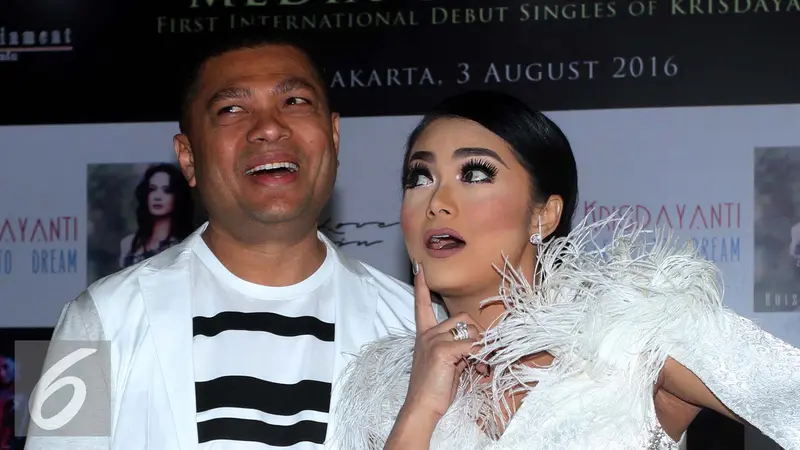 Krisdayanti dan Raul Lemos