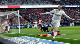 Pemain Real Madrid Gareth Bale melakukan selebrasi usai mencetak gol ke gawang Atletico Madrid pada pertandingan sepak bola La Liga Spanyol di Stadion Metropolitano, Madrid, Spanyol, 9 Februari 2019. Sebelum memutuskan untuk gantung sepatu, Bale memiliki karier cemerlang dengan menorehkan sejumlah prestasi. (AP Photo/Manu Fernandez, File)