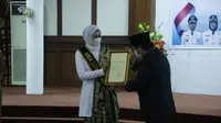 Pengukuhan Bunda Literasi Kabupaten Paser Sinta Rosmayenti di Pendopo Kabupaten Paser, Tana Paser, Senin (14/3/2022). (Liputan6.com/ Ist)