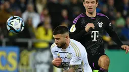 Tim raksasa Bundesliga ini membuka keunggulan terlebih dahulu pada menit ke-16 berkat gol Thomas Mueller. (Jean-Christophe VERHAEGEN / AFP)