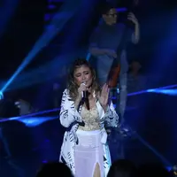 'Musiknya luar biasa. Asik banget,' ujar penyanyi bernama lengkap Agnes Monica Muljoto itu. (Nurwahyunan/Bintang.com)