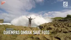 Kasihan, pria ini dihempas ombak saat ingin berfoto di pinggir pantai.