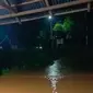 Banjir melanda Desa Soyowan, Kecamatan Ratatotok, Kabupaten Minahasa Tenggara, Sulut, akibat hujan deras mengguyur wilayah itu hingga Kamis malam (7/6/2024). (Liputan6.com/ Dok Ist)