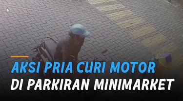 Terekam kamera cctv sebuah minimarket. Pria curi motor matic yang terparkir di parkiran minimarket tersebut.