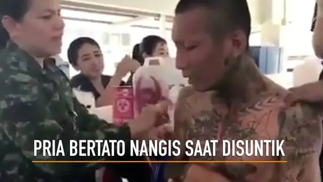 Video kocak menampilkan pria bertato nangis teredu-sedu saat hendak disuntik.