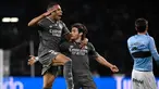 Penyerang Real Madrid, Kylian Mbappe (kiri) merayakan gol saat pertandingan Liga Spanyol melawan RC Celta de Vigo di stadion Balaidos, Vigo, Sabtu 19 Oktober 2024 atau Minggu (20/10/2024) dini hari WIB. (MIGUEL RIOPA/AFP)