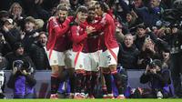 Manchester United meraih kemenangan 1-0 atas Fulham pada laga pekan ke-23 Premier League di Craven Cottage, London, Senin (27/01/2025) dini hari WIB. Gol tunggal kemenangan MU disarangkan Lisandro Martinez. (AP Photo/Kirsty Wigglesworth)