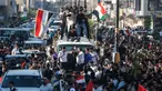 Ribuan warga tumpah ruah di jalanan merayakan keberhasilan tim nasional Irak lolos ke Piala Dunia 2026. (AFP/Ahmad Al-Rubbaye)