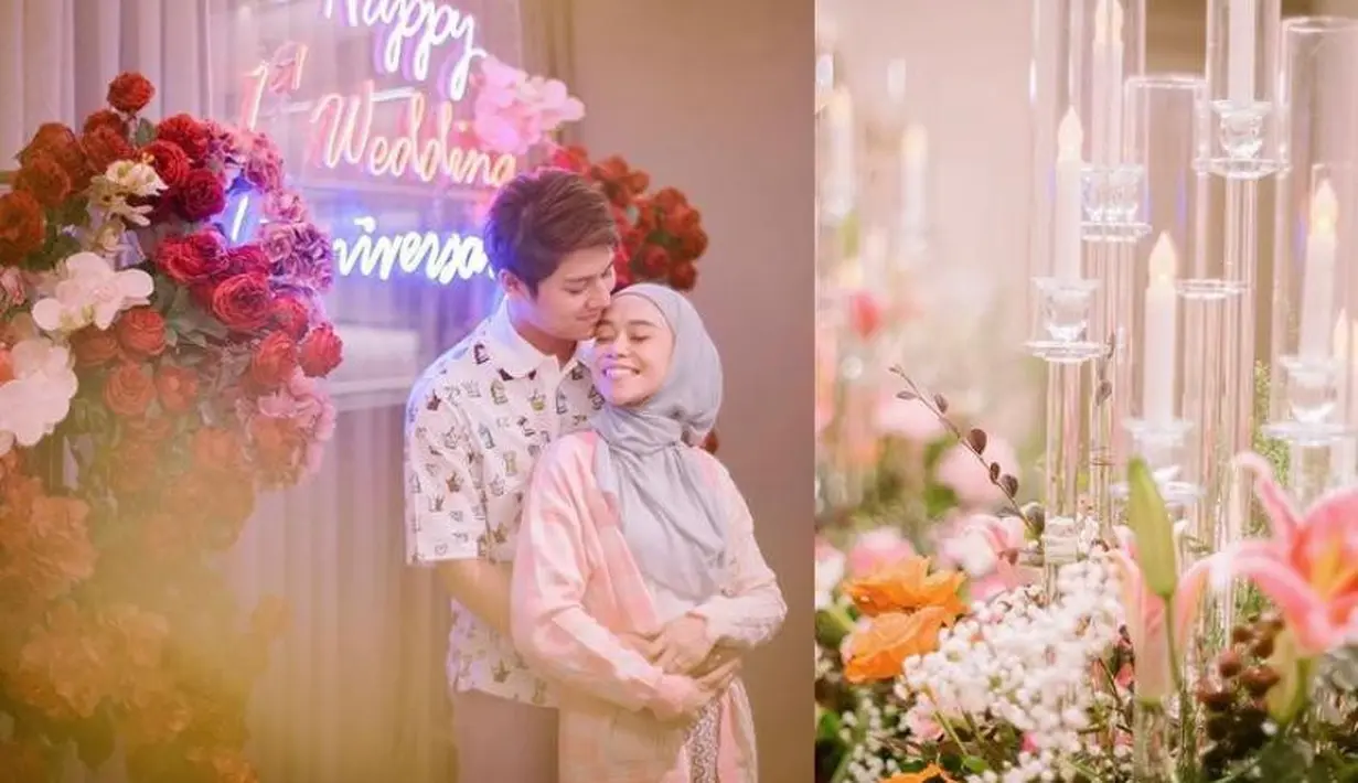 Momen romantis keduanya diabadikan apik oleh Askar Photography. Tampak dekorasi bunga dan tulisan ‘Happy 1 Wedding Anniversary’ menghiasi ruangan.  (Instagram/askar_photography/lestykejora).