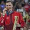 Tunggal putra Denmark, Viktor Axelsen merebut medali emas pada Olimpiade Paris 2024 setelah mengalahkan tunggal putra Thailand, Kunlavut Vitidsarn dengan dua gim langsung, 21-11, 21-11. (AP Photo/Dita Alangkara)