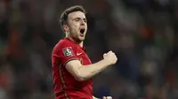 Penyerang Portugal, Diogo Jota berselebrasi usai mencetak gol ke gawang Turki pada pertandingan playoff Piala Dunia 2022 di stadion Dragao di Porto, Portugal, Jumat (25/3/2022). Menang 3-1 membuat Timnas Portugal semakin dengan tiket Piala Dunia 2022. (AP Photo/Luis Vieira)