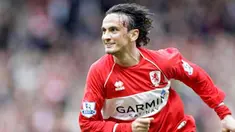 Aksi striker Middlesbrough, Tuncay Sanli setelah menjebol gawang Aston Villa di laga EPL yang berlangsung di Riverside Stadium, Middlesbrough, 16 Mei 2009. AFP PHOTO/GRAHAM STUART