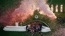 Pemain Atletico Madrid merayakan kemenangannya saat menjadi juara Liga Europa usai mengalahkan Marseille di Stade de Lyon, Prancis (16/5). (AP Photo / Christophe Ena)