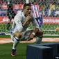 Cristiano Ronaldo lakukan selebrasi unik usai cetak gol ke gawang Atletico Madrid (Reuters / Sergio Perez)
