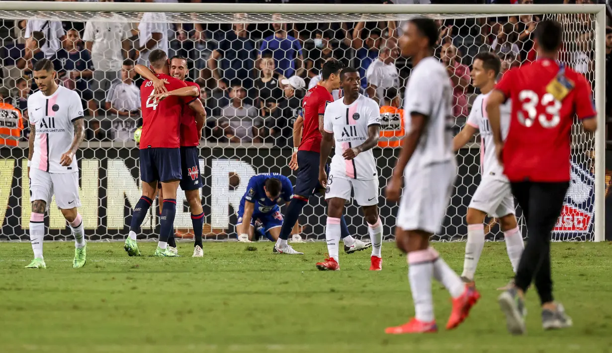 Skor 1-0 akhirnya bertahan hingga laga selesai. Hasil tersebut membuat Lille mencetak sejarah baru dengan berhasil memenangkan gelar Trophée des Champions untuk pertama kalinya. Selain itu mereka juga sukses hentikan dominasi PSG selama tujuh tahun berturut-turut. (Foto: AFP/Emmanuel Dunand)