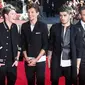 One Direction saat menghadiri premier film mereka berjudul 'One Direction: This Is Us' di London (20/8/2013). (AFP/Andrew Cowie)