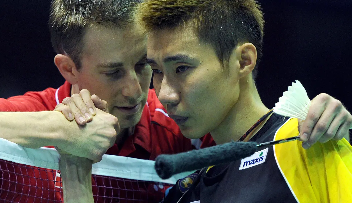Duel Peter Gade dan Lee Chong Wei saat keduanya bertemu di turnamen Piala Thomas 2012 lalu. (AFP/Liu Jin)