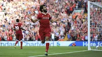 Mohamed Salah menyumbangkan satu gol untuk Liverpool saat melawan Arsenal pada lanjutan Premier League di Anfield Stadium, Liverpool, (27/8/2017). Liverpool menang 4-0. (Peter Byrne/PA via AP)