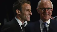 Presiden Prancis Emmanuel Macron dan Perdana Menteri Australia Malcolm Turnbull (Mick Tsikas/Pool via AP)