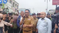Gubernur Jawa Barat, Ridwan Kamil bersama Wali Kota Depok, Mohammad Idris meresmikan pembangunan underpass Jalan Dewi Sartika, Kota Depok. (Liputan6.com/Dicky Agung Prihanto)