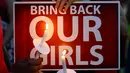 Aksi demonstrasi menentang kasus penculikan ratusan anak sekolah perempuan di Nigeria oleh kelompok teroris Boko Haram, mulai merebak ke penjuru dunia. (REUTERS/Phil McCarten)