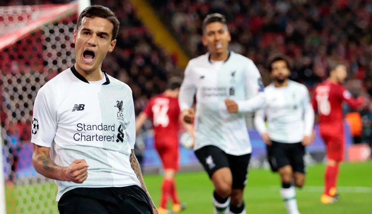 Pemain Liverpool, Philippe Coutinho berselebrasi setelah mencetak gol ke gawang Spartak Moskow pada matchday 2 Grup E Liga Champions di Otkrytiye Arena, Rabu (27/9). Liverpool harus puas bermain imbang 1-1 di kandang Spartak Moskow. (AP /Ivan Sekretarev)