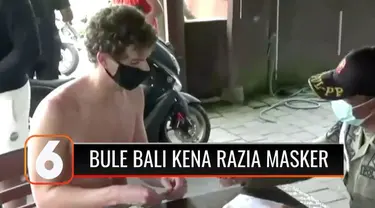 Petugas gabungan menjaring puluhan warga negara asing (WNA) di kawasan Kuta Utara, Bali, yang tidak memakai masker. Petugas menjatuhkan denda Rp 100 ribu kepada para turis asing yang tidak memakai masker.