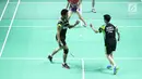 Ganda campuran Indonesia, Tontowi Ahmad/Liliyana Natsir saat melawan Tan Kian Meng/Lai Pei Jing (Malaysia) pada babak pertama Indonesia Open 2018 di Istora GBK, Jakarta, Selasa (3/7). Tontowi/Liliyana unggul 21-11, 21-14. (Liputan6.com/Helmi Fithriansyah)