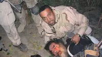 Penangkapan Saddam Hussein oleh pasukan AS 13 Desember 2003 (US Army)