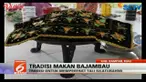Tradisi makan bajambau sudah berlangsung turun temurun di Kampar, Riau.