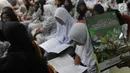 Suasana pelatihan 1000 juru bicara Pancasila di Aula Universitas Terbuka, Tangsel, Kamis (16/8). Kegiatan itu mendapat penghargaan World Guiness book of record dari Guinness World's Record Adjudicator Seyda Subasi.(Merdeka.com/Arie Basuki)