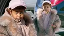 North West, putri kecil pasangan Kanye West dan Kim Kardashian tampil modis dengan mantel bulu saat menghabiskan waktu bersama sepupu-sepupunya dan juga Kourtney Kardashian di kawasan Los Angeles, Selasa (29/12). (mirror.co.uk)