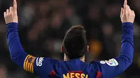 Bintang Barcelona Lionel Messi merayakan gol ke gawang  Real Mallorca di Camp Nou, Sabtu (7/12/2019) atau Minggu dini hari WIB. (AFP/Josep Lago)