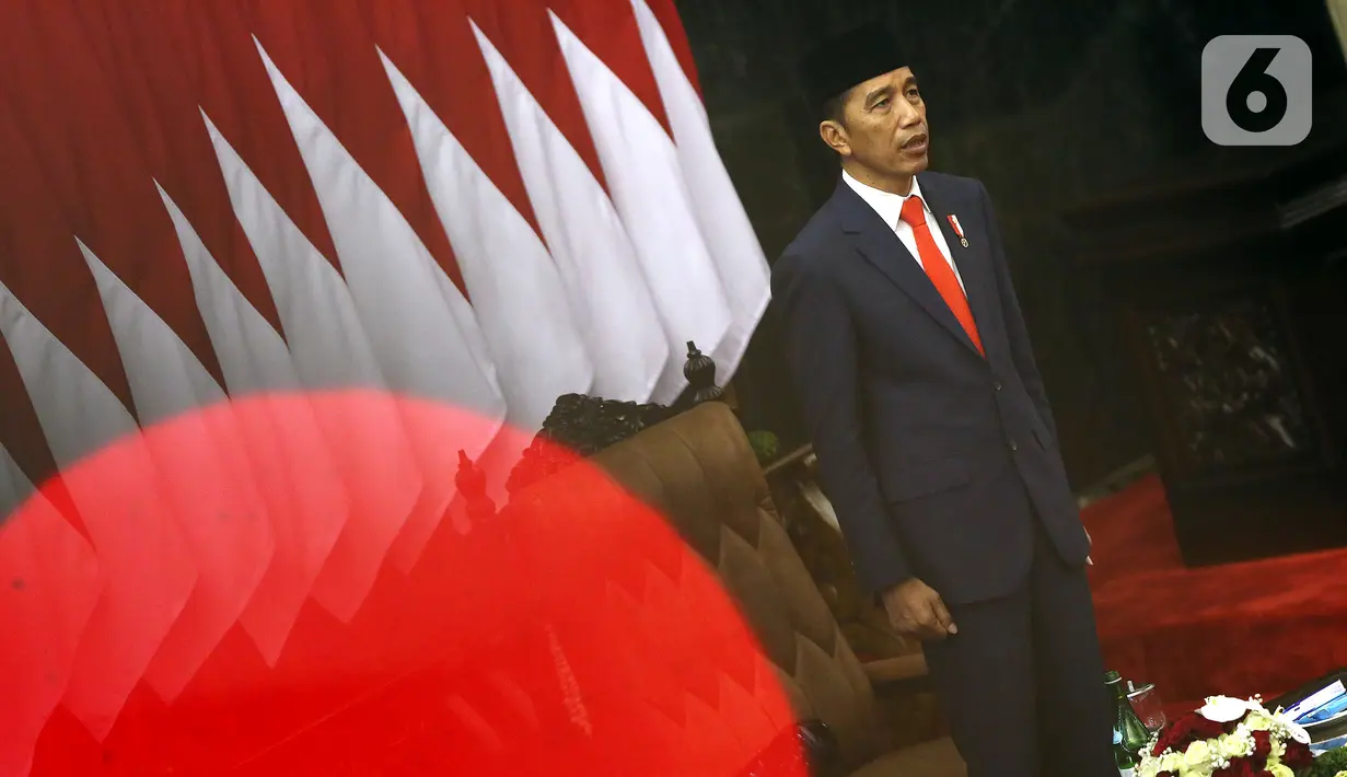 Joko Widodo atau Jokowi saat menghadiri pelantikannya sebagai Presiden RI periode 2019-2024 di Gedung Nusantara, Jakarta, Minggu (20/10/2019). Jokowi dan Ma'ruf Amin resmi dilantik sebagai Presiden dan Wakil Presiden RI periode 2019-2024. (Liputan6.com/JohanTallo)