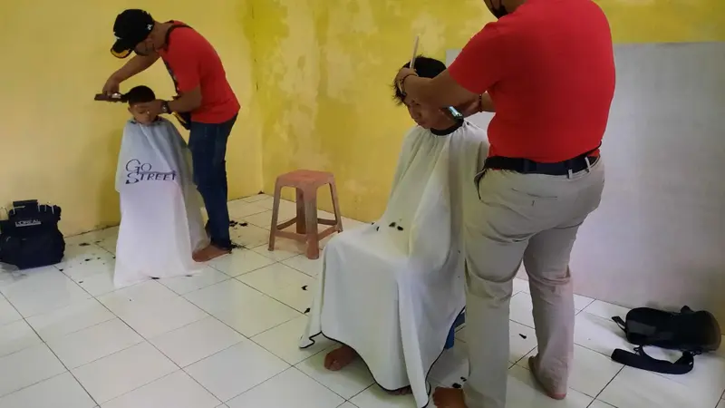 Pangkas rambut anak disabilitas