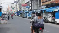 Selain digunakan PKl, kawasan Jalan A. Yani atau Pengkolan Garut, Jawa Barat kerapd iguanakan kegiatan Care Free Day (CFD) oleh masyarakat Garut setiap akhir pekan, namun kini berhenti. (Liputan6.com/Jayadi Supriadin)